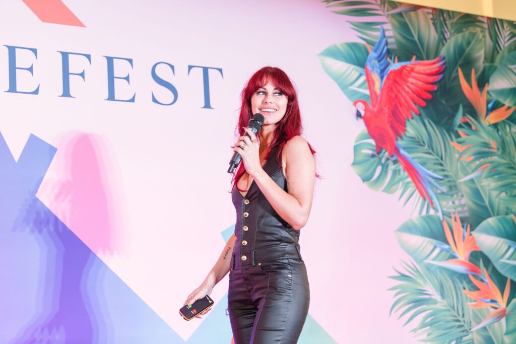 Speaker on stage at PEAKEFEST near NEC